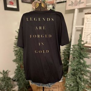 Nike Men’s Athletic Cut Dri-Fit Black with Gold Lettering Tee.